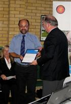 Paul receiving his award from Peter Hockley of the Somerset FA